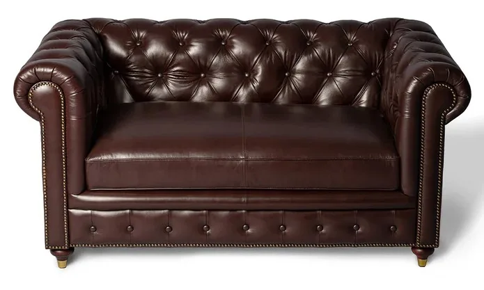 Tan leather sofa after stain removal and deep conditioning